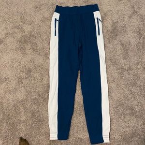 Fabletics Blue and White pants with side zip pockets